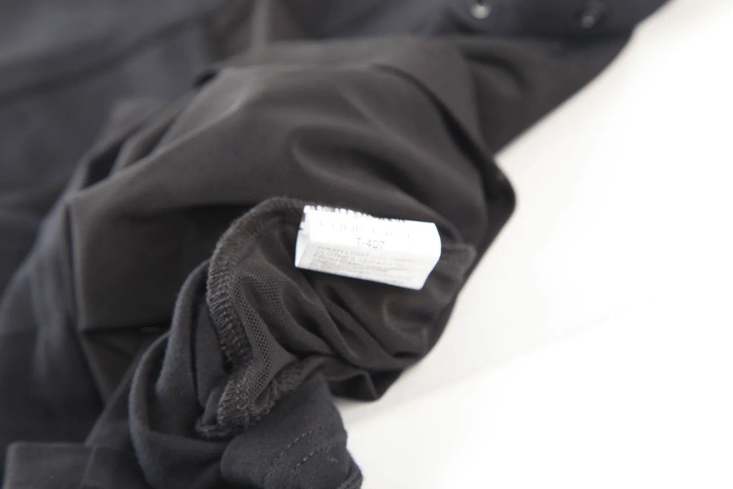 Edgy Black Hooded Top with Mesh Sleeves for Women